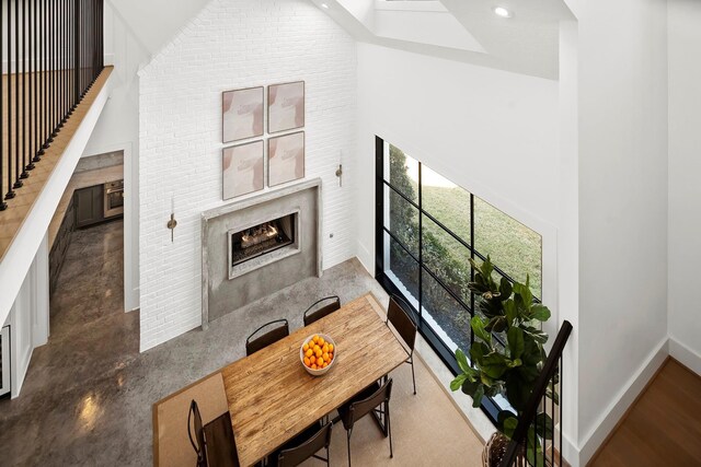 7010 Bowie Ct, Montgomery, TX 77316 - living area featuring a towering ceiling, a fireplace, and recessed lighting