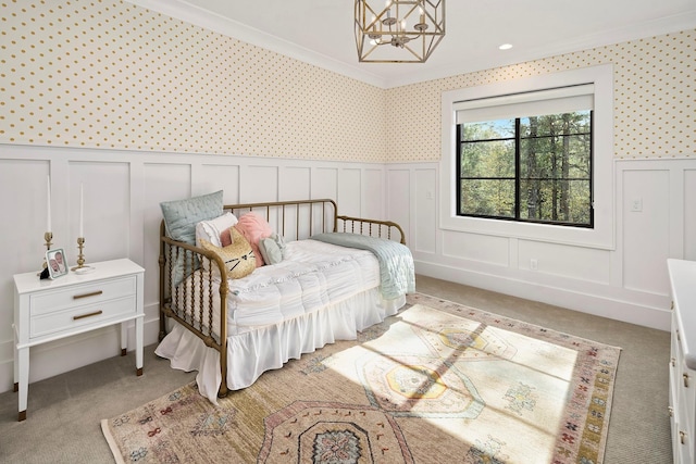 bedroom with light carpet, a chandelier, and ornamental molding