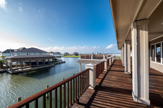 1245 Lagoon Dr, Crystal Beach, TX 77650 - view of dock featuring a water view