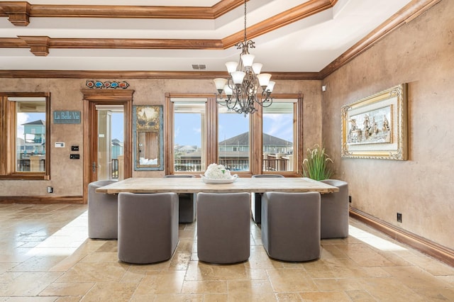 1245 Lagoon Dr, Crystal Beach, TX 77650 - dining space featuring crown molding and an inviting chandelier