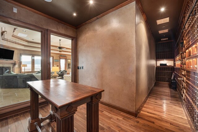 1245 Lagoon Dr, Crystal Beach, TX 77650 - interior space featuring wood-type flooring and crown molding