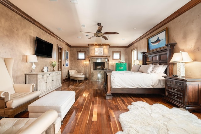 1245 Lagoon Dr, Crystal Beach, TX 77650 - bedroom featuring ceiling fan, dark hardwood / wood-style flooring, and crown molding