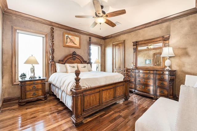 1245 Lagoon Dr, Crystal Beach, TX 77650 - bedroom featuring ceiling fan, ornamental molding, and dark wood-type flooring
