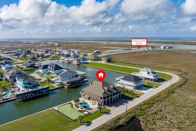 1245 Lagoon Dr, Crystal Beach, TX 77650 - bird's eye view with a water view