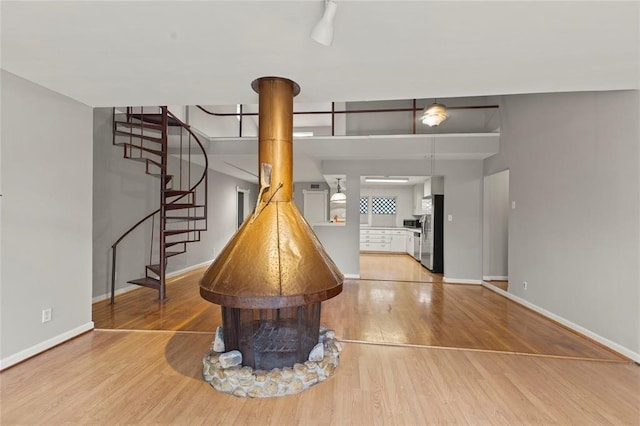 foyer entrance with light wood-type flooring