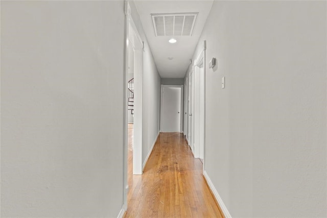 hallway featuring light wood-type flooring