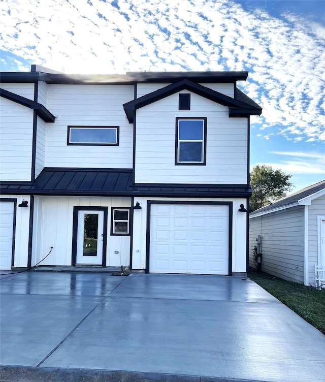 front facade with a garage