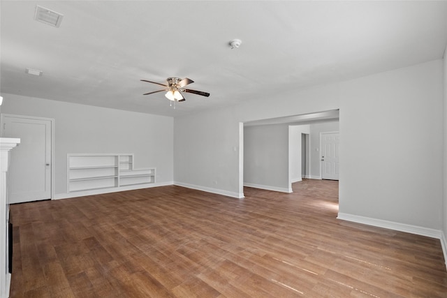 unfurnished living room featuring ceiling fan, light hardwood / wood-style flooring, and built in features