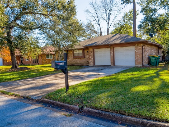 ranch-style home featuring a garage and a front yard