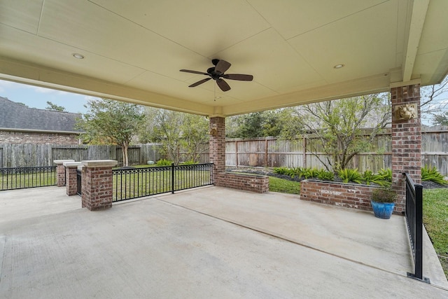 view of patio featuring ceiling fan