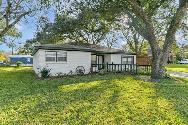 single story home with a front yard