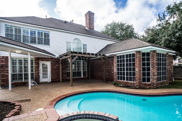 view of pool featuring a patio area and a pergola