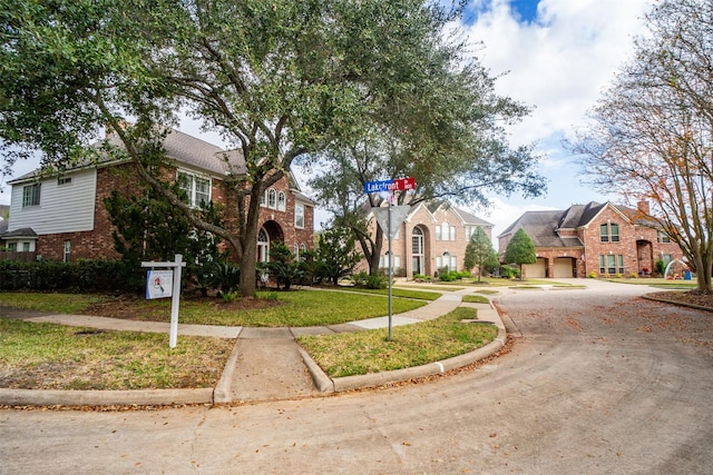 view of community featuring a lawn