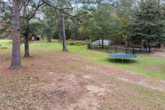 view of yard featuring a trampoline