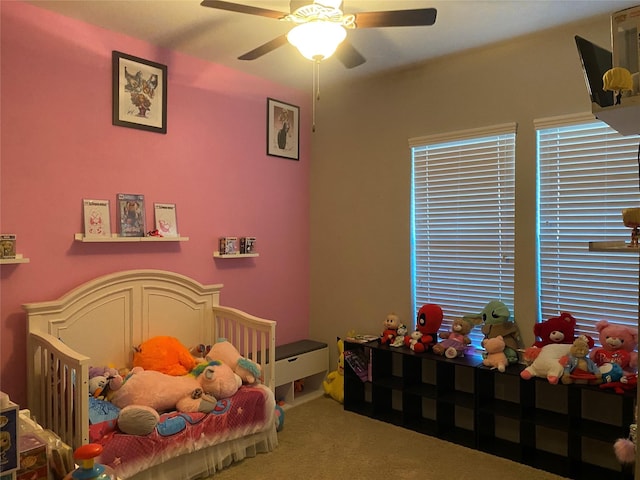 carpeted bedroom with ceiling fan