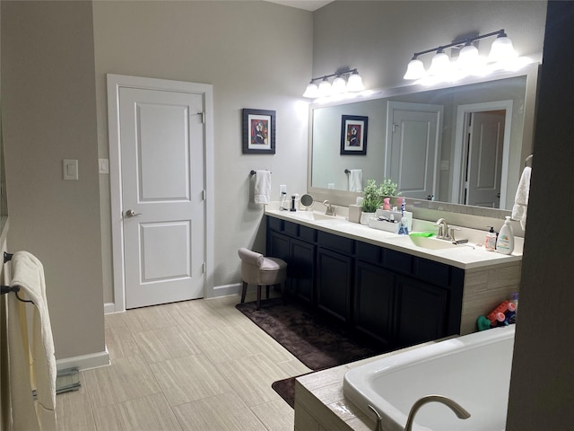 bathroom featuring a bathing tub and vanity