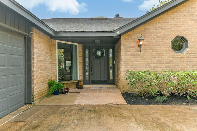 property entrance featuring a garage