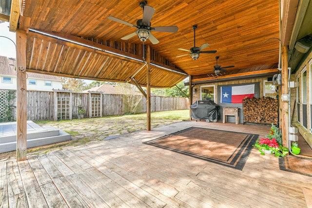 view of patio featuring area for grilling and a wooden deck