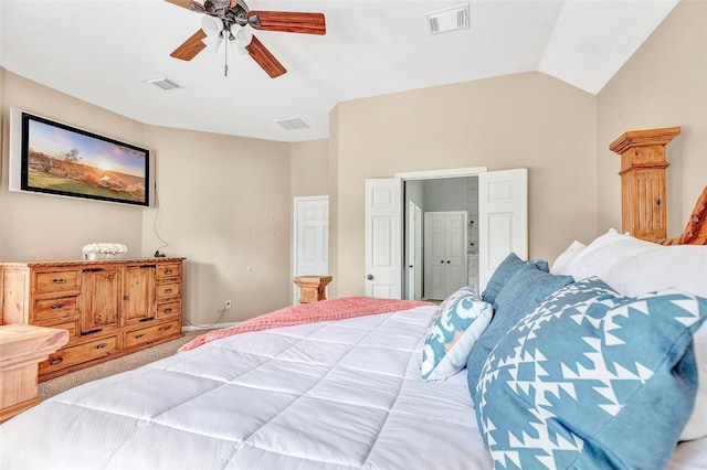 carpeted bedroom featuring ceiling fan and lofted ceiling