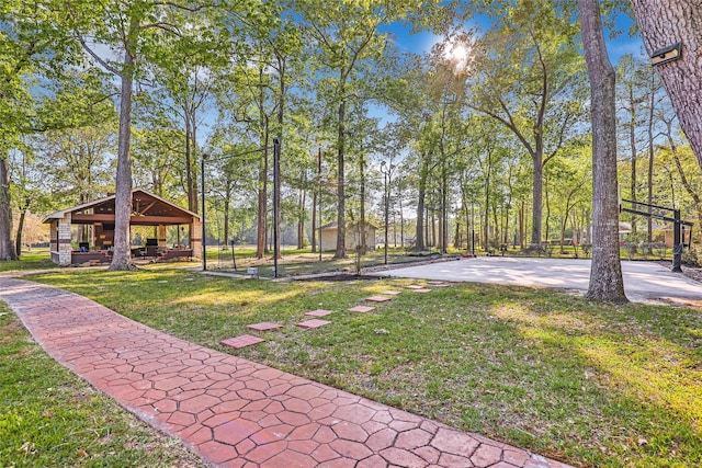 view of property's community featuring a gazebo and a lawn