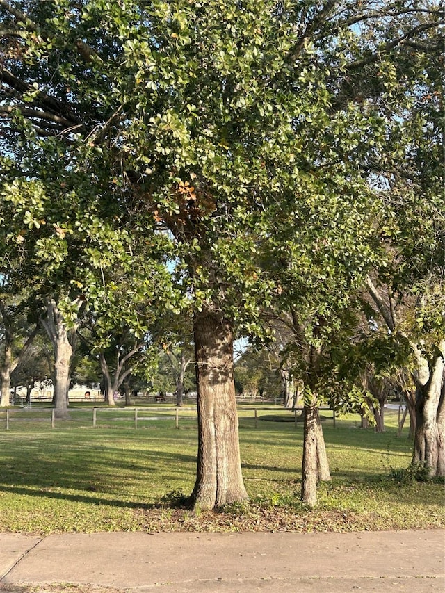 surrounding community featuring a lawn