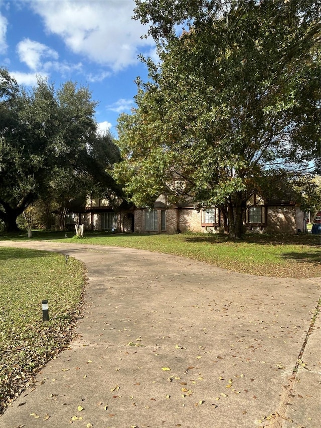 17622 Queenslake Dr, Cypress, TX 77429 - view of property's community featuring curved driveway