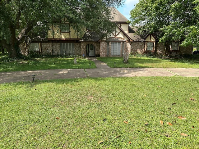 17622 Queenslake Dr, Cypress, TX 77429 - view of front of house featuring brick siding and a front yard