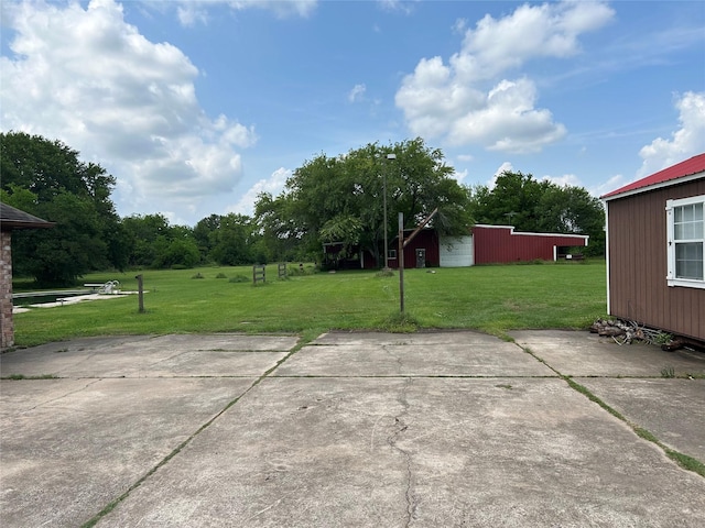 17622 Queenslake Dr, Cypress, TX 77429 - view of patio / terrace with a pole building