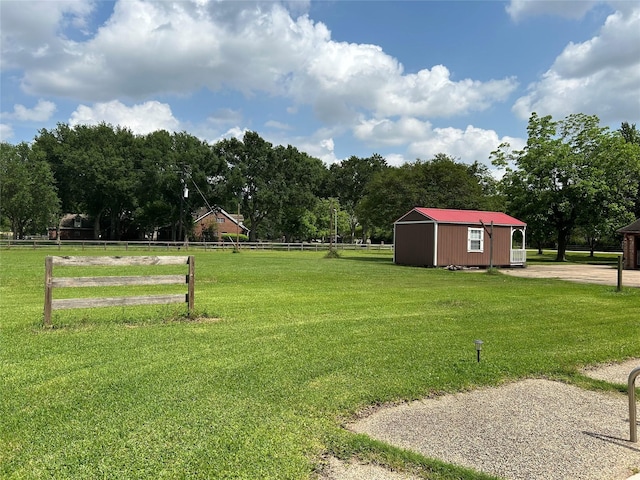 17622 Queenslake Dr, Cypress, TX 77429 - view of yard with an outdoor structure and fence