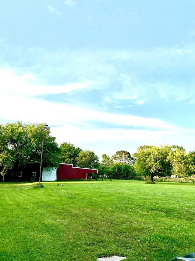 17622 Queenslake Dr, Cypress, TX 77429 - view of yard featuring an outdoor structure and an outbuilding