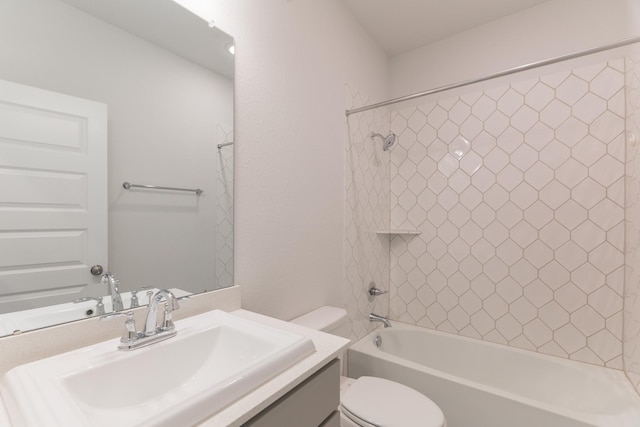 full bathroom featuring shower / tub combination, vanity, and toilet