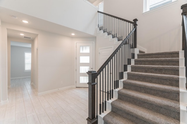 stairs with a towering ceiling