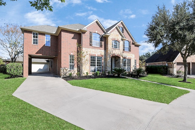 view of front of property featuring a garage and a front yard