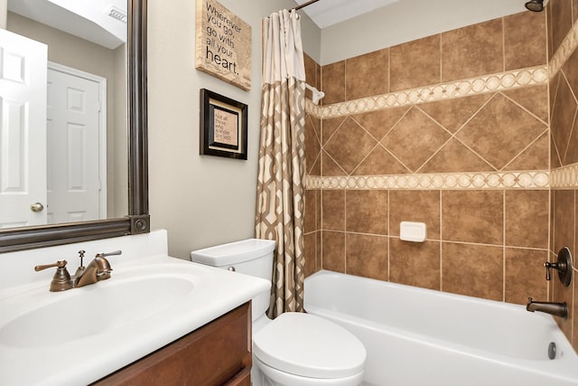 full bathroom with vanity, toilet, and shower / bath combo with shower curtain