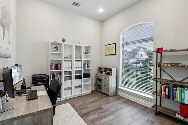 office area with hardwood / wood-style flooring