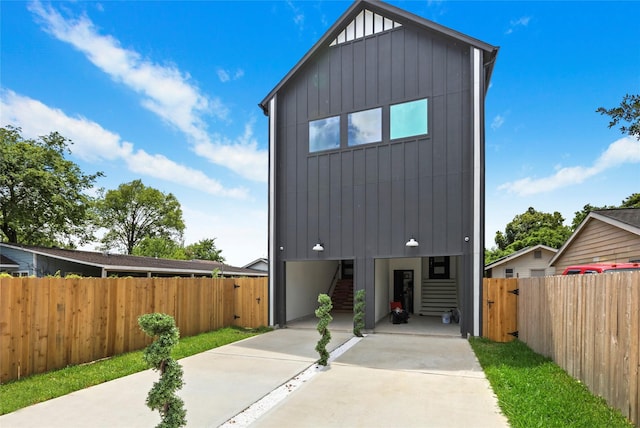 view of front of home featuring a carport