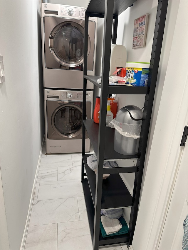 laundry area featuring stacked washer and clothes dryer