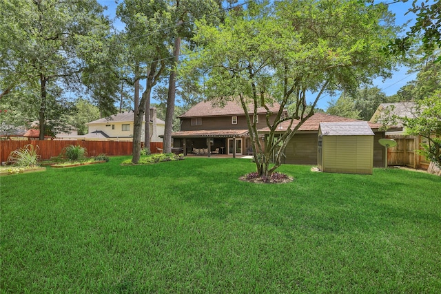 view of yard featuring a storage unit