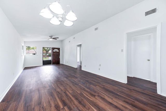 interior space featuring ceiling fan with notable chandelier and dark hardwood / wood-style flooring