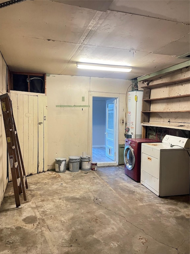 basement with washer and dryer and gas water heater