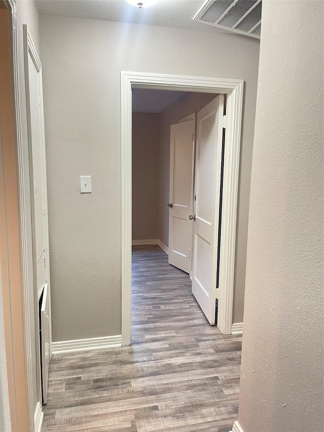 hall featuring light hardwood / wood-style floors