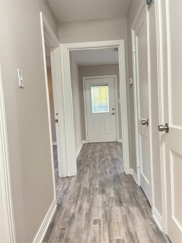 hall featuring hardwood / wood-style flooring