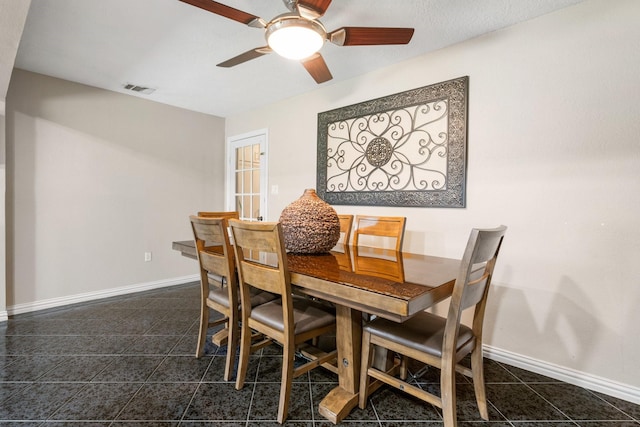 dining area featuring ceiling fan