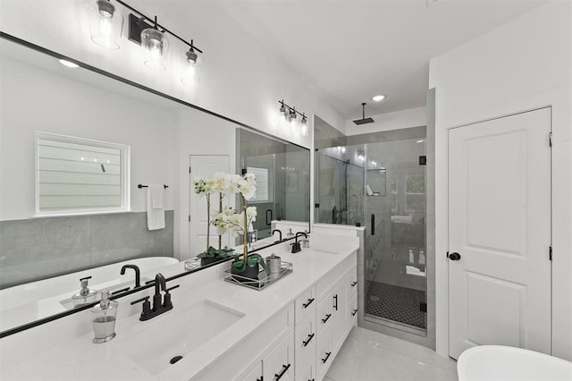 bathroom with tile patterned flooring, vanity, and separate shower and tub