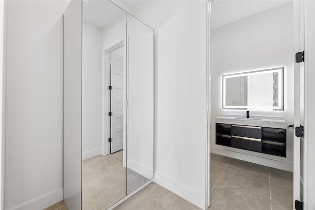 bathroom with vanity and tile patterned floors