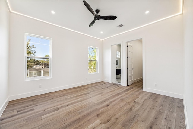 unfurnished bedroom with ceiling fan and light hardwood / wood-style floors