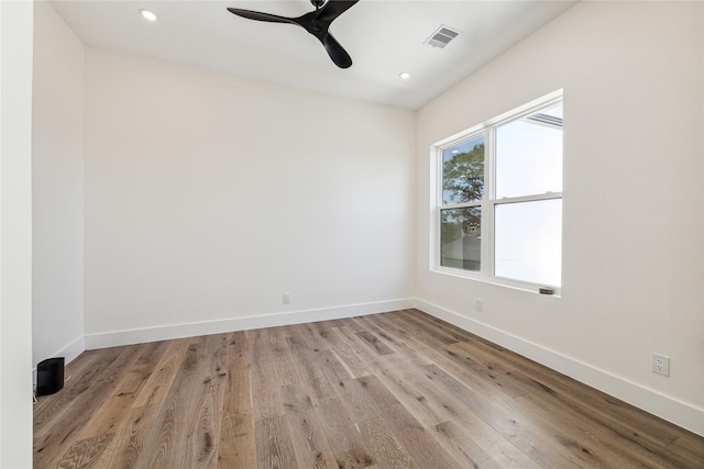 unfurnished room featuring ceiling fan and light hardwood / wood-style floors