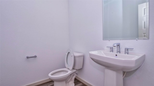 bathroom featuring toilet