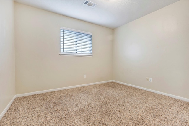 spare room with carpet floors