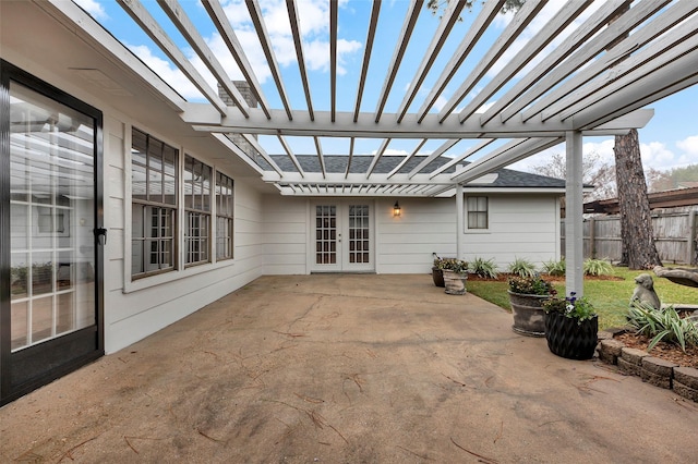 view of patio / terrace with a pergola and french doors